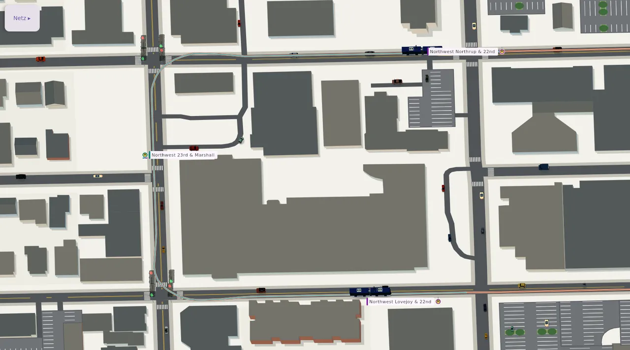 Straßenraster im Nordwesten der Portland-Pilotkarte mit zwei Streetcars, Autos und Parkplätzen.