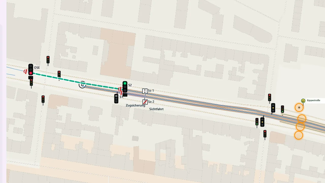 Straßenbahnstrecke an der Haltestelle Lippestraße mit Hauptsignalen, den Tafeln So 1 und So 2 und einem markierten Sicherungsabschnitt.